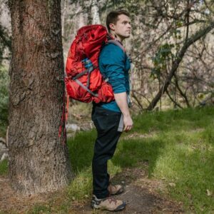 Red Backpacker on the forest