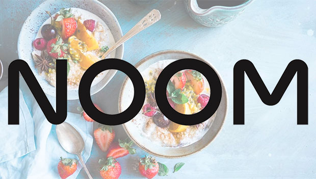noom logo over fruit bowls