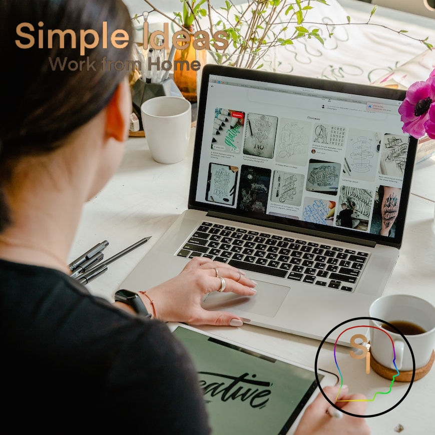 Woman designing a website on a laptop