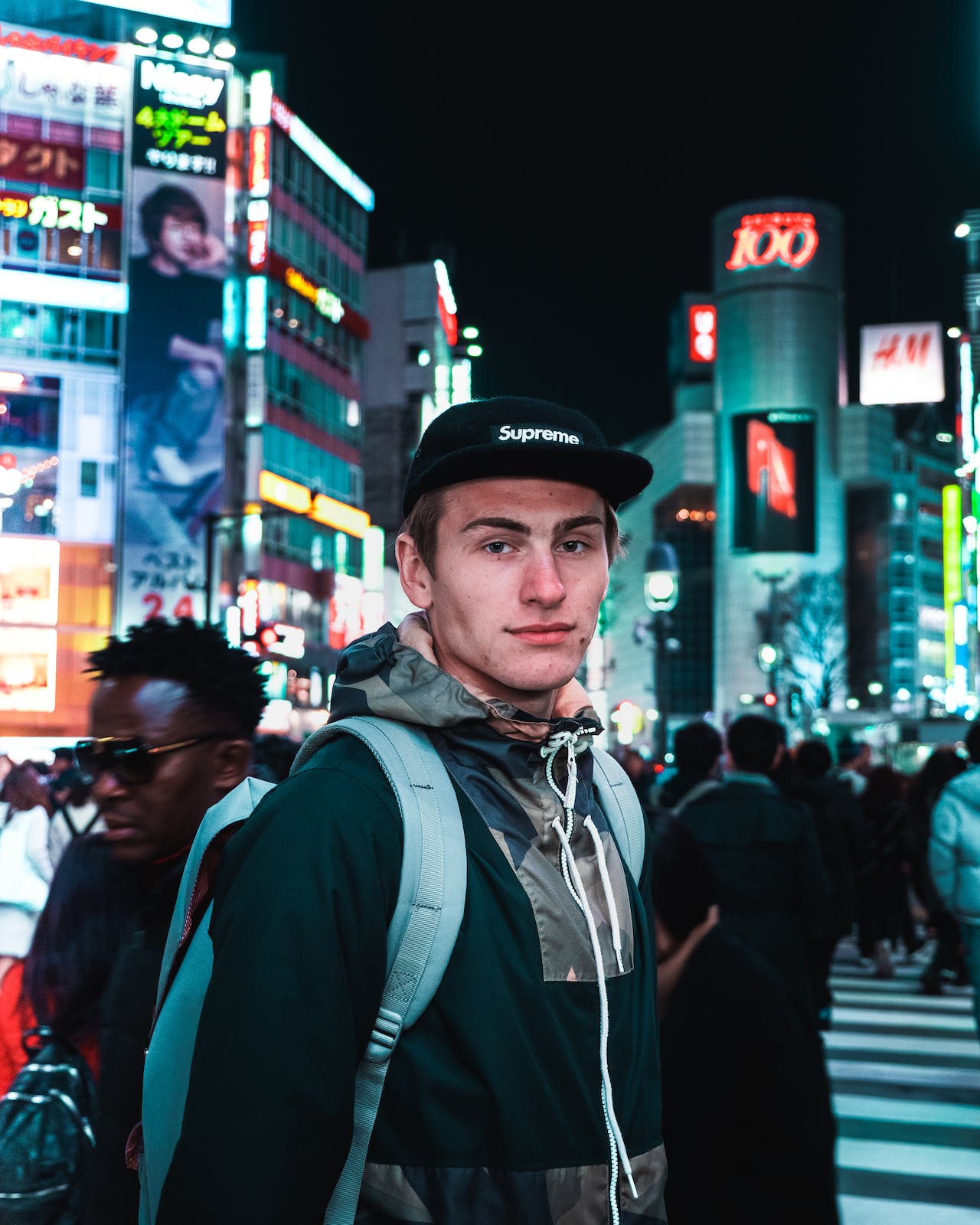Man with a hat in Tokyo
