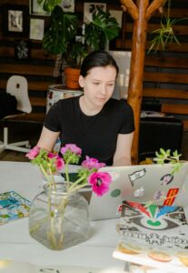 Woman designer workin on a laptop
