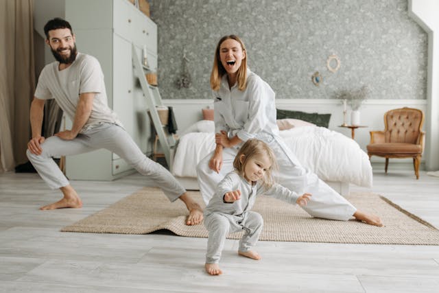 family doing yoga in white pijamas